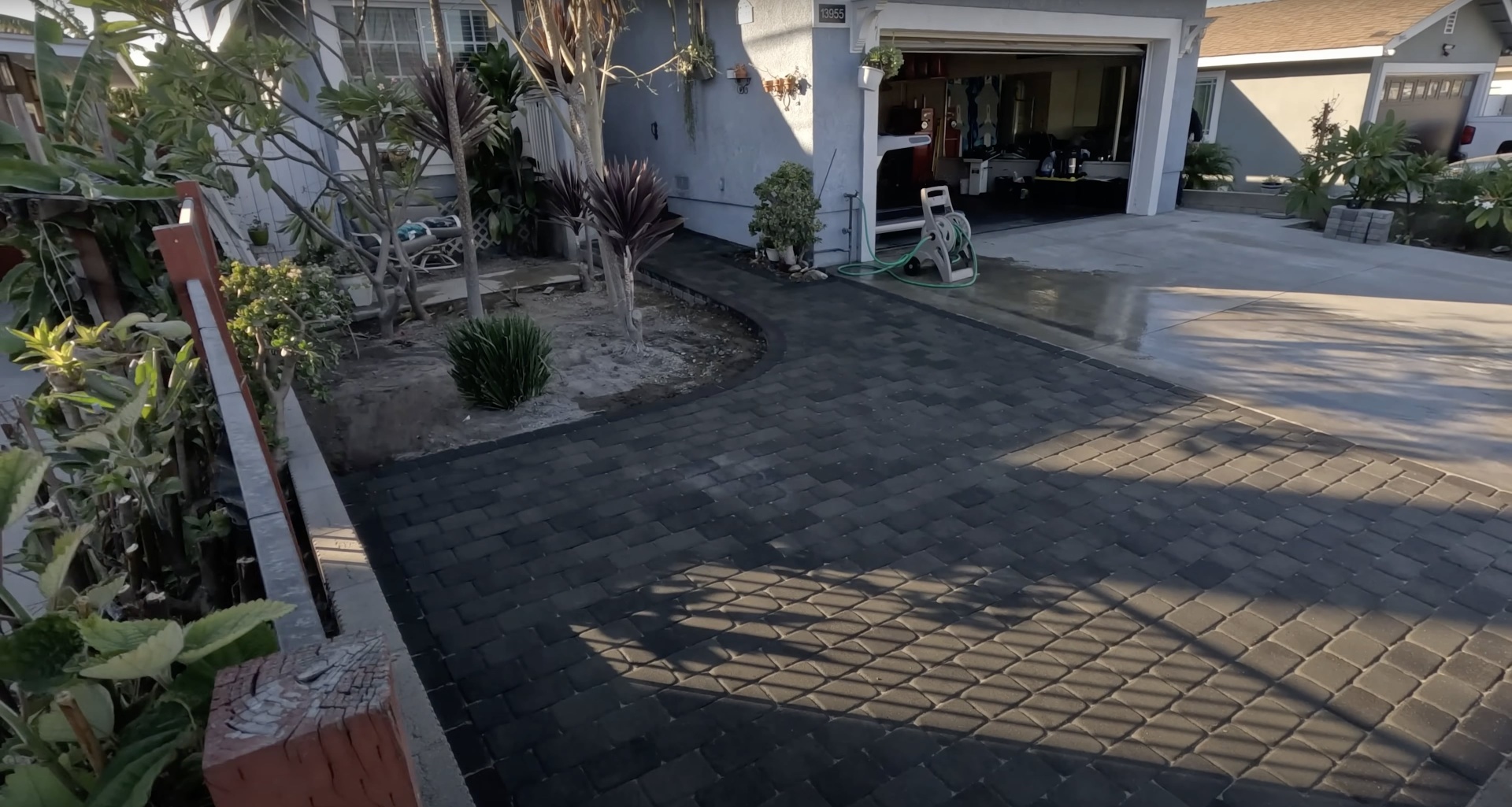 Professional concrete driveway and patio work by Waterbury Concrete Construction Finished concrete driveway and patio installation at residential property in Waterbury CT